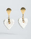 Gold teardrop stud earrings with white/gray Talavera ceramic heart drops.