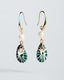 Gold hook earrings with freshwater pearl and green-and-white Talavera ceramic teardrop charms.