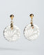 Gold ball-stud earrings with gray-and-white Talavera ceramic disc drops.