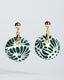 Gold ball-stud earrings with green-and-white Talavera ceramic disc drops.