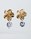 Gold flower earrings with hand-painted blue-and-white Talavera ceramic bead drops.