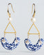 Gold hook geometric earrings with freshwater pearl, triangle frame, and blue-and-white Talavera ceramic crescent drops.