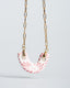 Gold paperclip chain necklace with hand-painted blush pink Talavera ceramic crescent pendant.