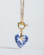 Gold paperclip toggle chain necklace with hand-painted blue-and-white Talavera ceramic heart pendant.
