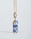 Gold chain necklace with hand‑painted blue‑and‑white Talavera rectangle ceramic tile pendant.