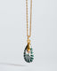 Gold chain necklace with hand‑painted green‑and‑white Talavera ceramic teardrop pendant.